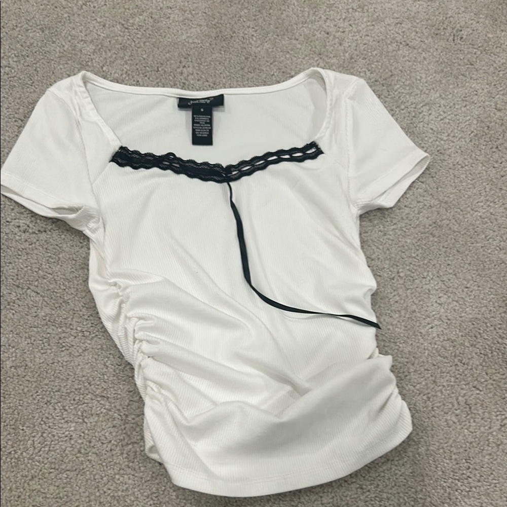 Elegant White Top with Black Lace Detail